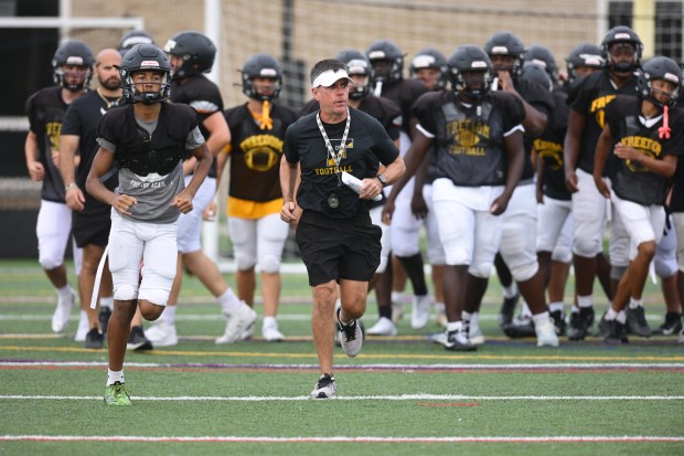 Freedom head coach Jason Roeder works with his team Monday, Aug. 17, 2026, during their football practice in Bethlehem. Freedom is coming off a tough season by their standards. The Patriots were 5-6 last season, but are optimistic about staging a turnaround. (Monica Cabrera/The Morning Call)