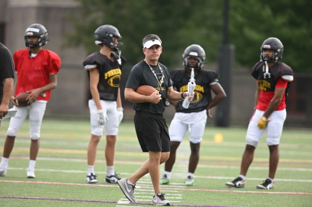 Freedom head coach Jason Roeder works with his team Monday, Aug. 17, 2026, during their football practice in Bethlehem. Freedom is coming off a tough season by their standards. The Patriots were 5-6 last season, but are optimistic about staging a turnaround. (Monica Cabrera/The Morning Call)