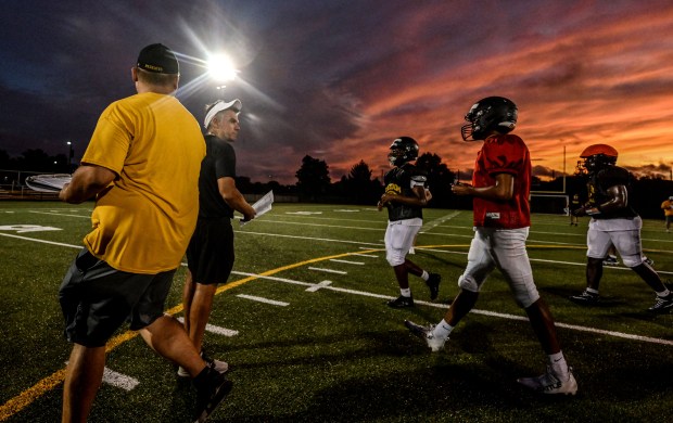 Freedom head coach Jason Roeder works with his team Monday, Aug. 17, 2026, during their football practice in Bethlehem. Freedom is coming off a tough season by their standards. The Patriots were 5-6 last season, but are optimistic about staging a turnaround. (Monica Cabrera/The Morning Call)