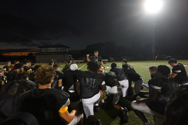 Freedom head coach Jason Roeder works with his team Monday, Aug. 17, 2026, during their football practice in Bethlehem. Freedom is coming off a tough season by their standards. The Patriots were 5-6 last season, but are optimistic about staging a turnaround. (Monica Cabrera/The Morning Call)