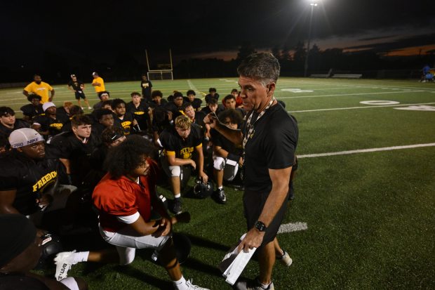 Freedom head coach Jason Roeder works with his team Monday, Aug. 17, 2026, during their football practice in Bethlehem. Freedom is coming off a tough season by their standards. The Patriots were 5-6 last season, but are optimistic about staging a turnaround. (Monica Cabrera/The Morning Call)