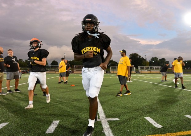 Freedom High School Football team players run drills Monday, Aug. 17, 2026, during practice in Bethlehem. Freedom is coming off a tough season by their standards. The Patriots were 5-6 last season, but are optimistic about staging a turnaround. (Monica Cabrera/The Morning Call)