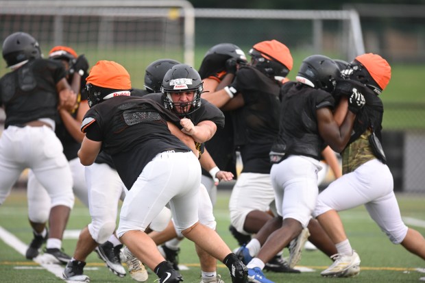 Freedom High School Football players run drills Monday, Aug. 17, 2026, during their football practice in Bethlehem. Freedom is coming off a tough season by their standards. The Patriots were 5-6 last season, but are optimistic about staging a turnaround. (Monica Cabrera/The Morning Call)