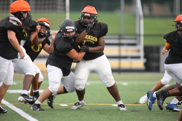 Freedom High School Football players run drills Monday, Aug. 17, 2026, during their football practice in Bethlehem. Freedom is coming off a tough season by their standards. The Patriots were 5-6 last season, but are optimistic about staging a turnaround. (Monica Cabrera/The Morning Call)