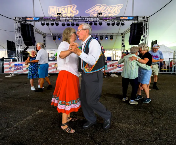 Katherine Indrisek and Eddie Hotza polka Sunday, Aug. 9, 2026, as John Stevens' Doubleshot Polka Band plays at Service Electric Festplatz on the last day of Musikfest in Bethlehem. (April Gamiz/The Morning Call)