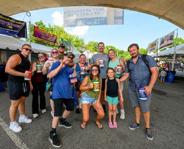 The Papasso family stops 'festing for a moment for a photo Sunday, Aug. 9, 2026, on the last day of Musikfest in Bethlehem. (April Gamiz/The Morning Call)