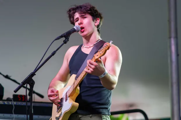 Festivalgoers enjoy food, music, and the atmosphere as they gather ahead of the evening's headlining performance during Musikfest on Sunday, Aug. 2, 2026, in Bethlehem. The annual festival runs through Aug. 9. (Jonathan Broady/Special to The Morning Call)