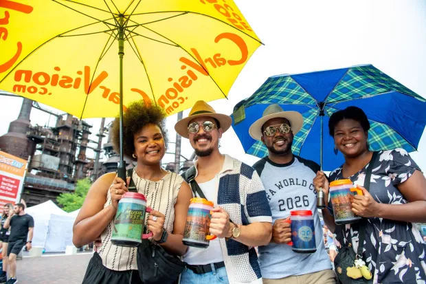 Festivalgoers enjoy food, music, and the atmosphere as they gather ahead of the evening's headlining performance during Musikfest on Sunday, Aug. 2, 2026, in Bethlehem. The annual festival runs through Aug. 9. (Jonathan Broady/Special to The Morning Call)