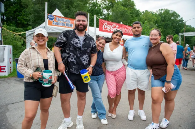 Festivalgoers enjoy food, music, and the atmosphere as they gather ahead of the evening's headlining performance during Musikfest on Sunday, Aug. 2, 2026, in Bethlehem. The annual festival runs through Aug. 9. (Jonathan Broady/Special to The Morning Call)