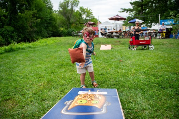 Festivalgoers enjoy food, music, and the atmosphere as they gather ahead of the evening's headlining performance during Musikfest on Sunday, Aug. 2, 2026, in Bethlehem. The annual festival runs through Aug. 9. (Jonathan Broady/Special to The Morning Call)