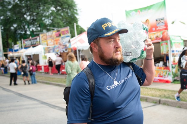 Festivalgoers enjoy food, music, and the atmosphere as they gather ahead of the evening's headlining performance during Musikfest on Sunday, Aug. 2, 2026, in Bethlehem. The annual festival runs through Aug. 9. (Jonathan Broady/Special to The Morning Call)