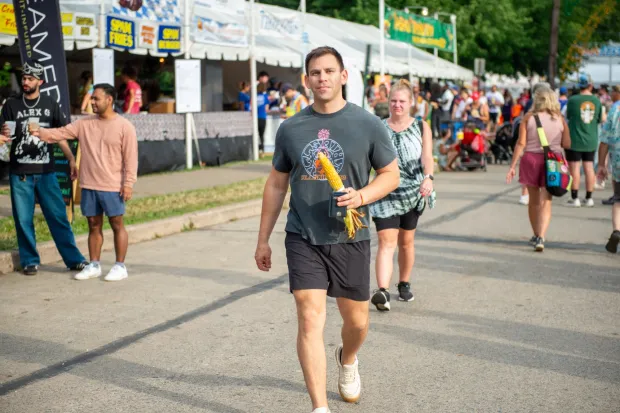 Festivalgoers enjoy food, music, and the atmosphere as they gather ahead of the evening's headlining performance during Musikfest on Sunday, Aug. 2, 2026, in Bethlehem. The annual festival runs through Aug. 9. (Jonathan Broady/Special to The Morning Call)