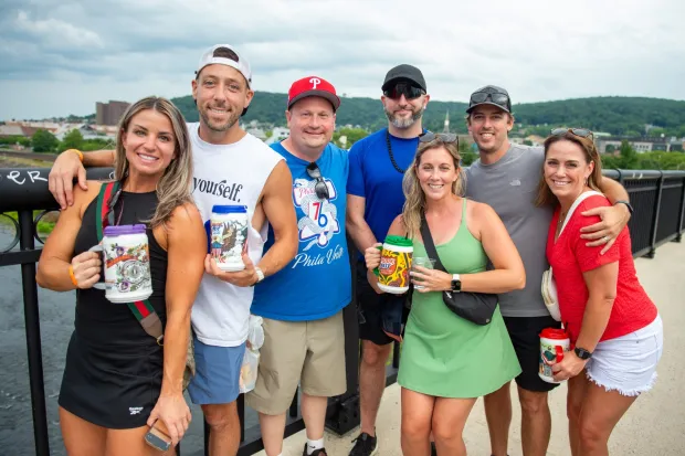 Festivalgoers enjoy food, music, and the atmosphere as they gather ahead of the evening's headlining performance during Musikfest on Sunday, Aug. 2, 2026, in Bethlehem. The annual festival runs through Aug. 9. (Jonathan Broady/Special to The Morning Call)