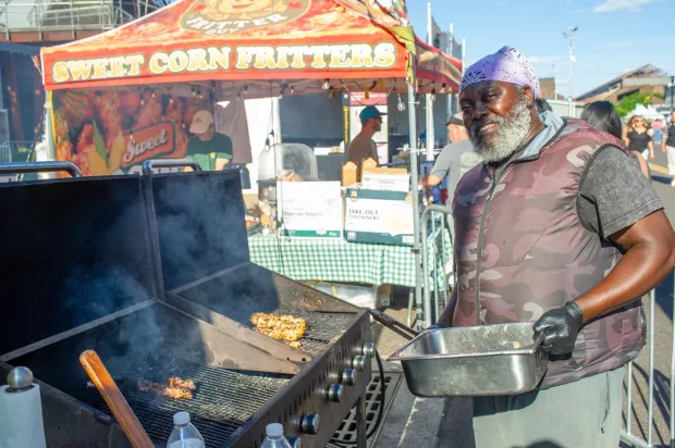 Festivalgoers enjoy food, music, and the atmosphere as they gather ahead of the evening's headlining performance during Musikfest on Monday, Aug. 3, 2026, in Bethlehem. The annual festival runs through Aug. 9. (Jonathan Broady/Special to The Morning Call)