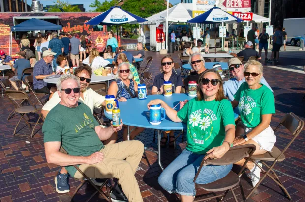 Festivalgoers enjoy food, music, and the atmosphere as they gather ahead of the evening's headlining performance during Musikfest on Monday, Aug. 3, 2026, in Bethlehem. The annual festival runs through Aug. 9. (Jonathan Broady/Special to The Morning Call)