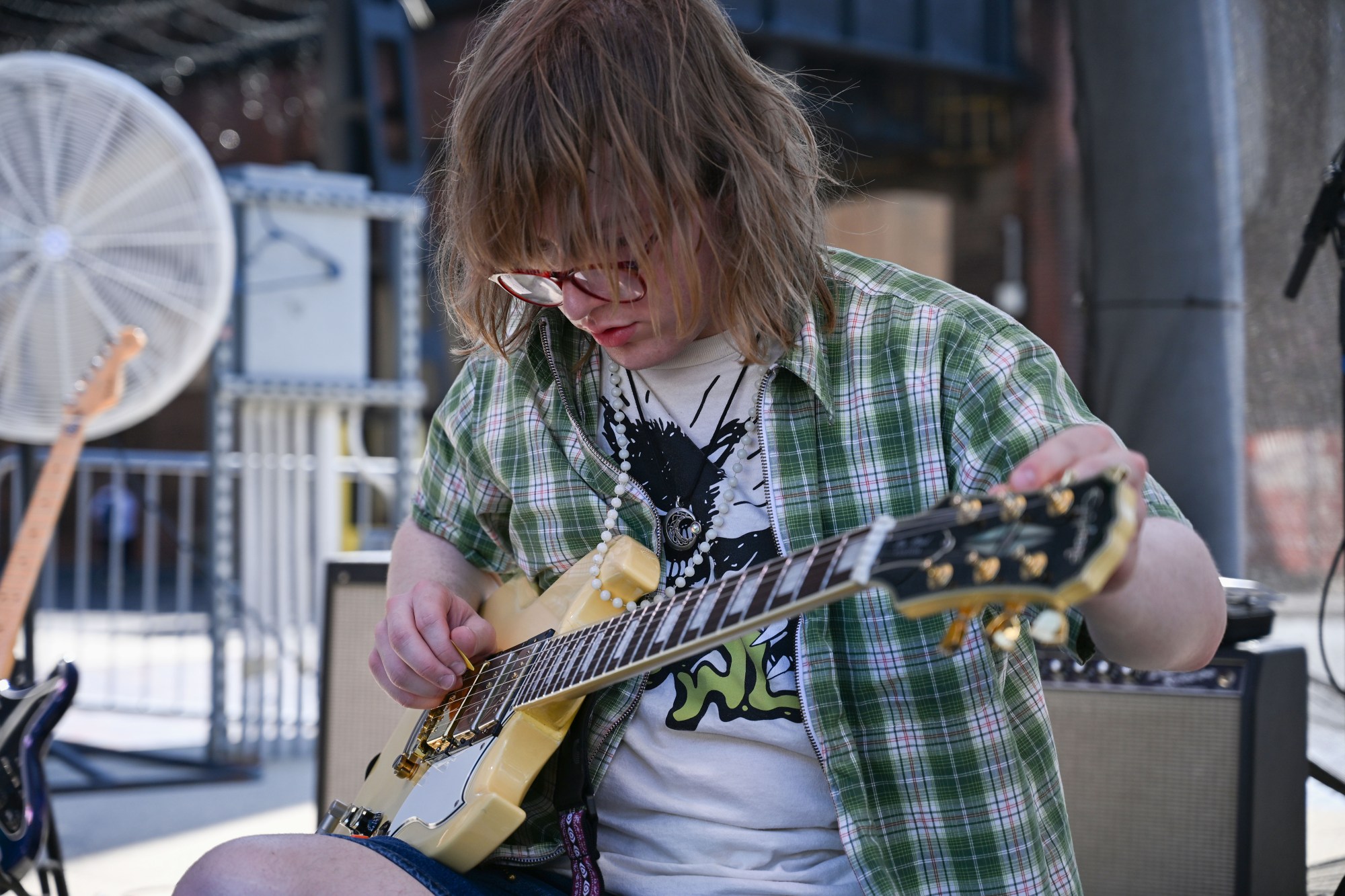 Tanner Brown of Bethlehem plays a guitar ahead of The Swell's performance at Musikfest Tuesday, Aug. 4, 2026, at the SteelStacks in Bethlehem. (Jon Chiu/The Morning Call)