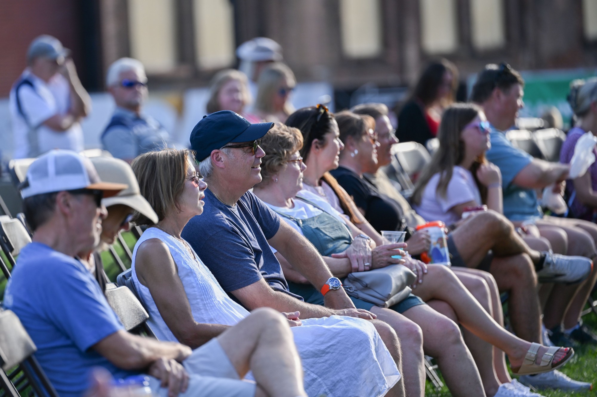 Festivalgoers enjoy food, music, and the atmosphere as they gather ahead of the evening's headlining performance during Musikfest on Tuesday, Aug. 4, 2026, in Bethlehem. The annual festival runs through Aug. 9. (Jon Chiu/The Morning Call)