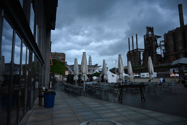 Storm clouds approach Musikfest on Friday, Aug. 7, 2026, at the SteelStacks in Bethlehem. (Jon Chiu/The Morning Call)