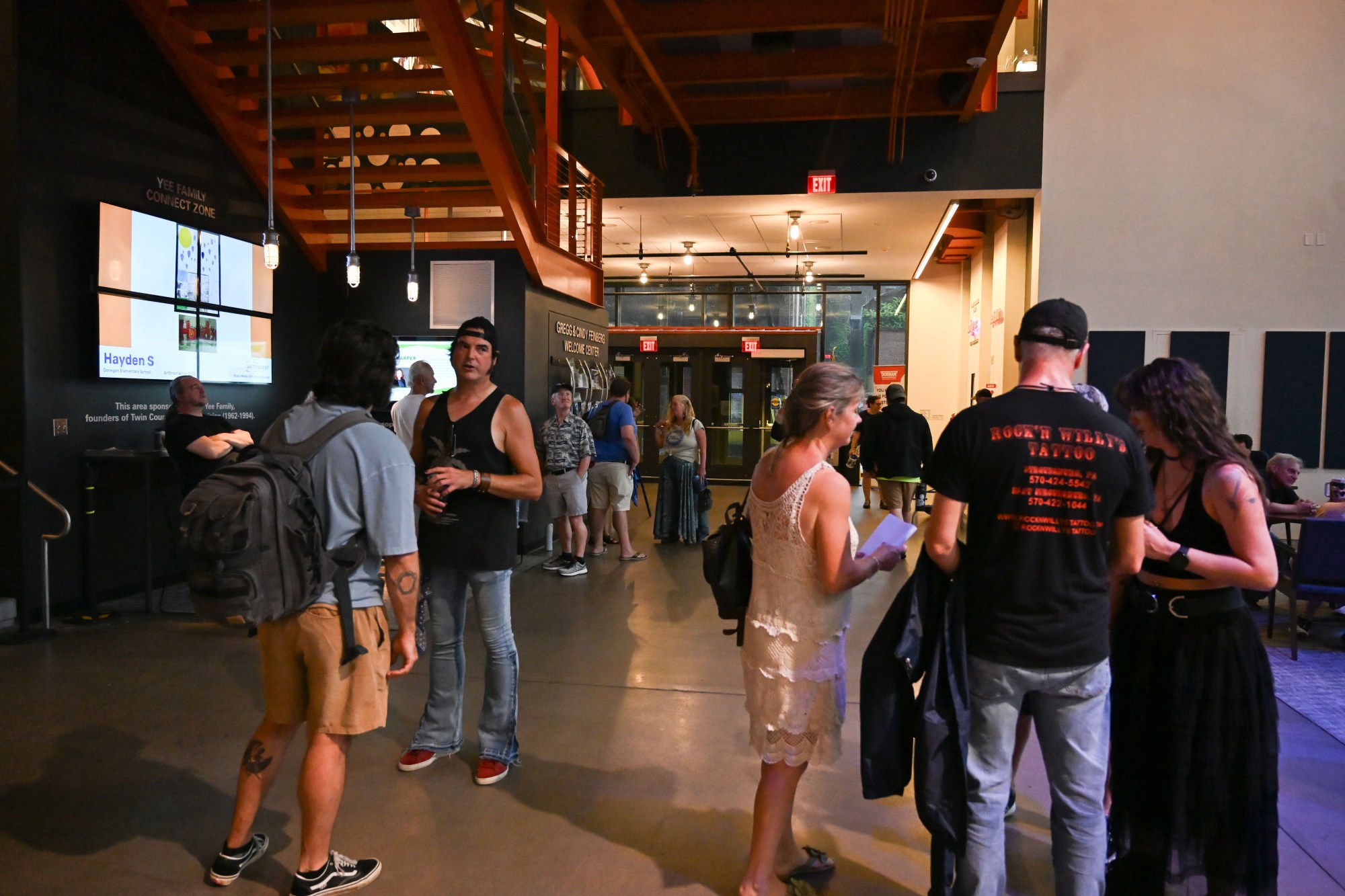 People seek shelter from a storm during Musikfest on Friday, Aug. 7, 2026, at the SteelStacks in Bethlehem. (Jon Chiu/The Morning Call)