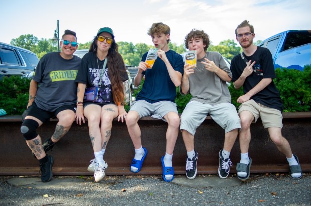Festivalgoers enjoy food, music, and the atmosphere as they gather ahead of the evening's headlining performance during Musikfest on Saturday, Aug. 8, 2026, in Bethlehem. The annual festival runs through Aug. 9. (Jonathan Broady/Special to The Morning Call)