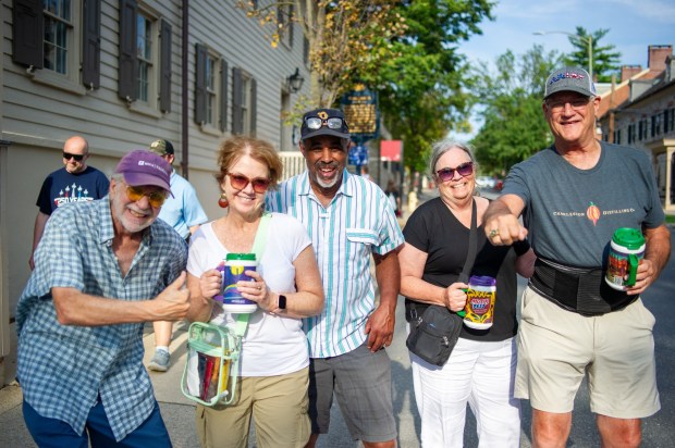 Festivalgoers enjoy food, music, and the atmosphere as they gather ahead of the evening's headlining performance during Musikfest on Saturday, Aug. 8, 2026, in Bethlehem. The annual festival runs through Aug. 9. (Jonathan Broady/Special to The Morning Call)