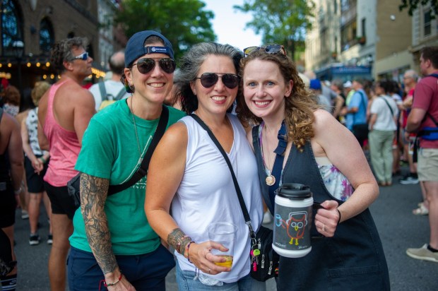 Festivalgoers enjoy food, music, and the atmosphere as they gather ahead of the evening's headlining performance during Musikfest on Saturday, Aug. 8, 2026, in Bethlehem. The annual festival runs through Aug. 9. (Jonathan Broady/Special to The Morning Call)