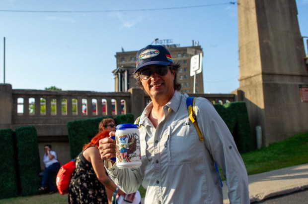 Festivalgoers enjoy food, music, and the atmosphere as they gather ahead of the evening's headlining performance during Musikfest on Saturday, Aug. 8, 2026, in Bethlehem. The annual festival runs through Aug. 9. (Jonathan Broady/Special to The Morning Call)