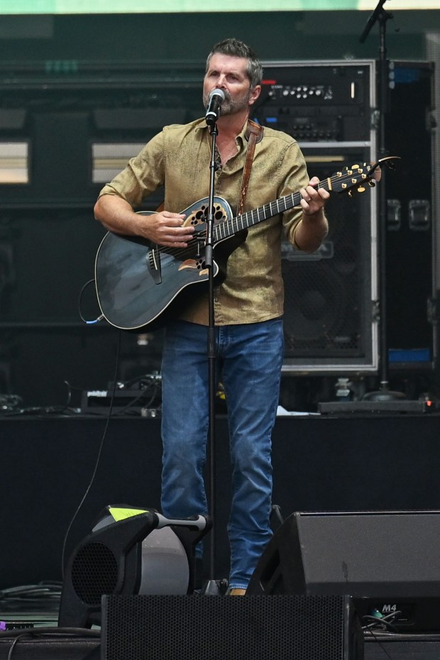 Colin McConnell plays the guitar as part of Southpaw's opener for Parker McCollum during Musikfest on Friday, Aug. 7, 2026, on the Wind Creek Steel Stage at PNC Plaza in Bethlehem. (Jon Chiu/The Morning Call)