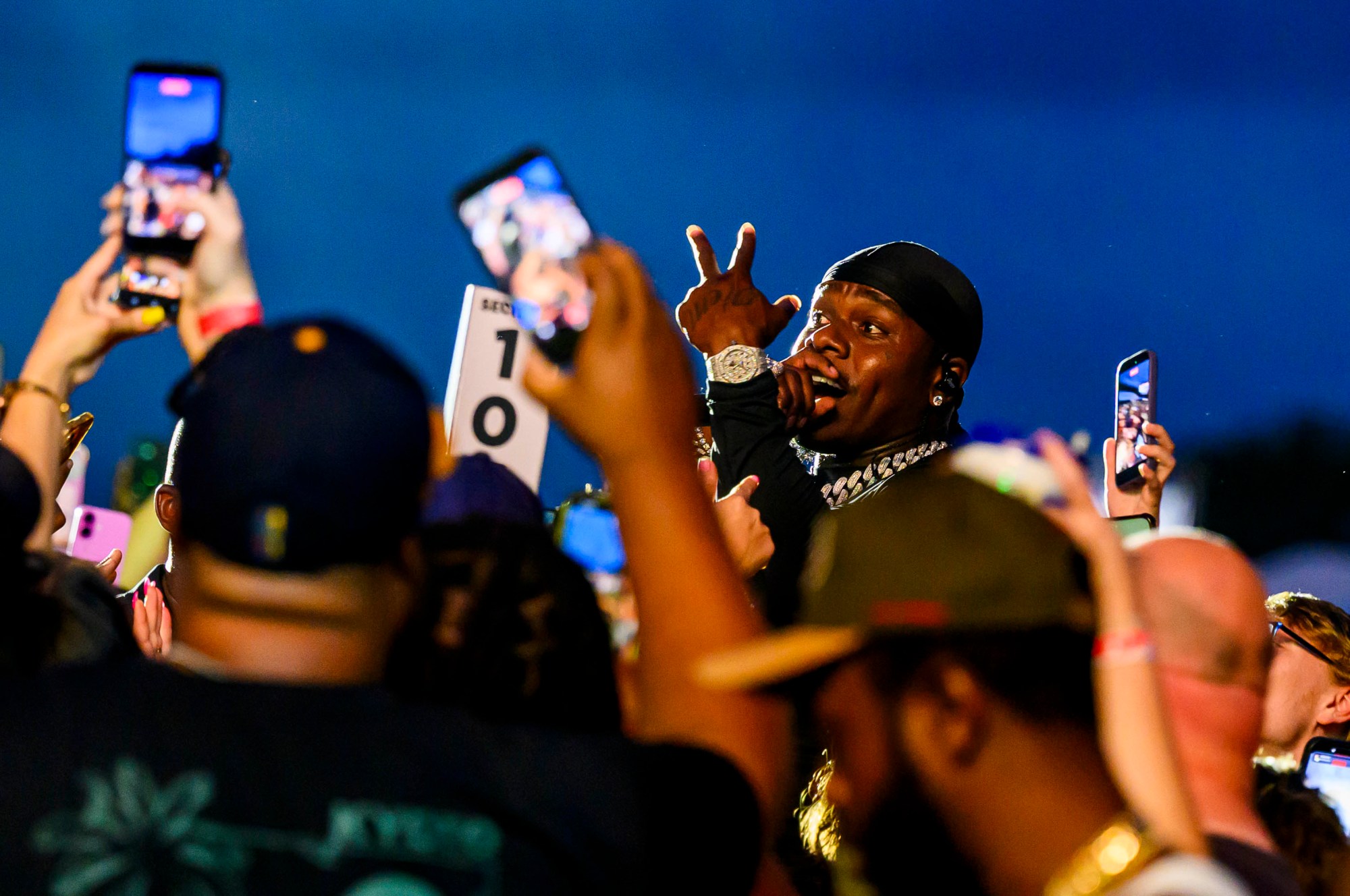 Rapper DaBaby performs in the crowd before rapper T.I. on Wednesday, Aug. 5, 2026, on Musikfest's Wind Creek Steel Stage at PNC Plaza in Bethlehem. Musikfest runs through Aug. 9. (April Gamiz/The Morning Call)