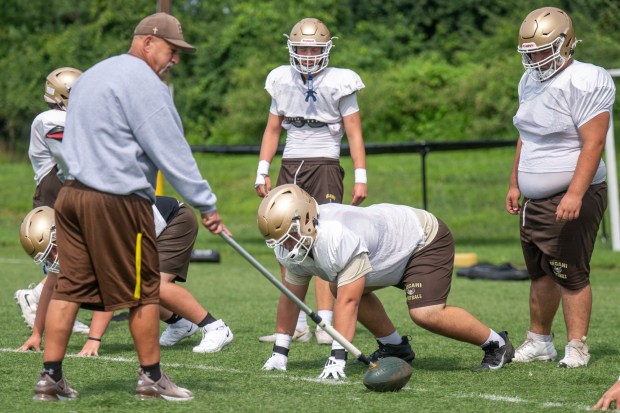 Football players run drills Friday, Aug. 14, 2026, during Bethlehem Catholic high school football practice in Bethlehem (Jonathan Broady/Special to The Morning Call)