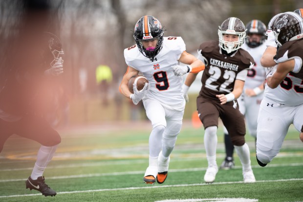 Northampton's Chase Kessler runs the ball against Catasauqua on Thursday, Nov. 27, 2025, at Catasauqua Alumni Field in Catasauqua. The contest marked the 100th anniversary of the first Thanksgiving game between the two schools and the 102nd game overall (they played twice in the first two years). (Jonathan Broady/Special to The Morning Call)