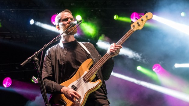 Adam Levin of the X Ambassadors plays guitar when the band opened Musikfest 2016 on the Sands Steel Stage on Friday at Steel Stacks in Bethlehem./(Ed. Note: NEWS - SHARON K. MERKEL / SPECIAL TO THE MORNING CALL - Shot 08/05/16)