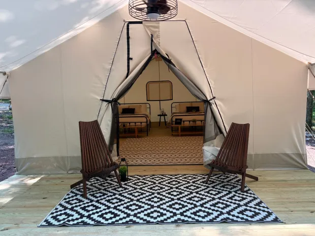 View of the porch outside a glamping tent at Hickory Run State Park. (Molly Bilinski / For Spotlight PA)
