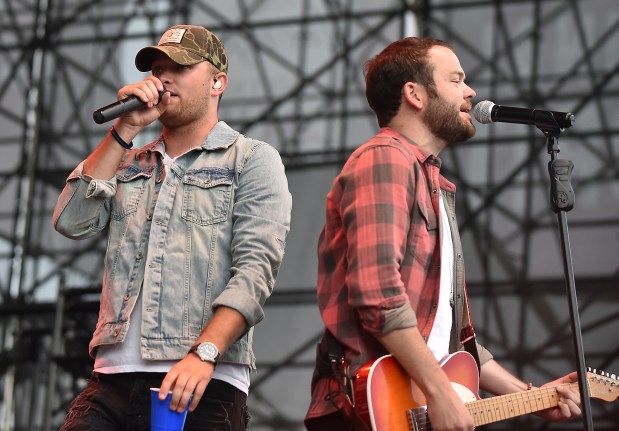 Jordan Walker (left) and Johnny McGuire of Walker McGuire performs at on the Sands Steel Stage at Musikfest on Saturday, August 12, 2017.Walker McGuire opens for headliners Justin Moore and Lee Brice. The show was sold-out. // 081217 // APRIL GAMIZ / THE MORNING CALL / keyword: Bartholomew // mc-ent-review-musikfest-lee-brice-justin-moore-bethlehem-20170808