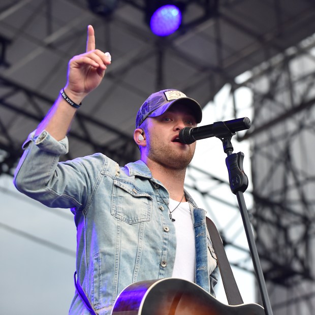 Jordan Walker and Johnny McGuire (not shown) of Walker McGuire performs at on the Sands Steel Stage at Musikfest on Saturday, August 12, 2017.Walker McGuire opens for headliners Justin Moore and Lee Brice. The show was sold-out. // 081217 // APRIL GAMIZ / THE MORNING CALL / keyword: Bartholomew // mc-ent-review-musikfest-lee-brice-justin-moore-bethlehem-20170808