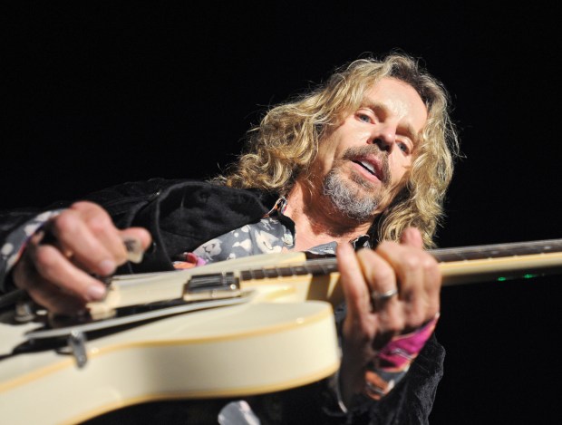 ABBY DREY / THE MORNING CALL Tommy Shaw, of Styx concentrates on the frets during the bands show at the RiverPlace stage at Musikfest on Thursday, August 12, 2010. ///mc-musikfest-review-styx-oyster- ORG XMIT: MC-styx-blueoyster-07