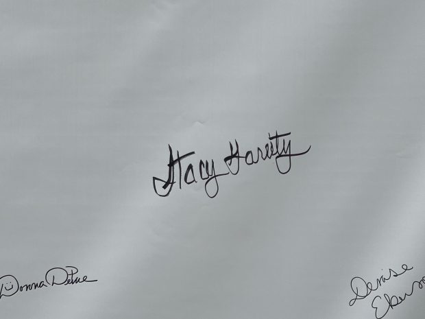 The signature of state Treasurer Stacy Garrity on an oversized copy of the Declaration of Independence outside the Metcalf mansion in Tunkhannock