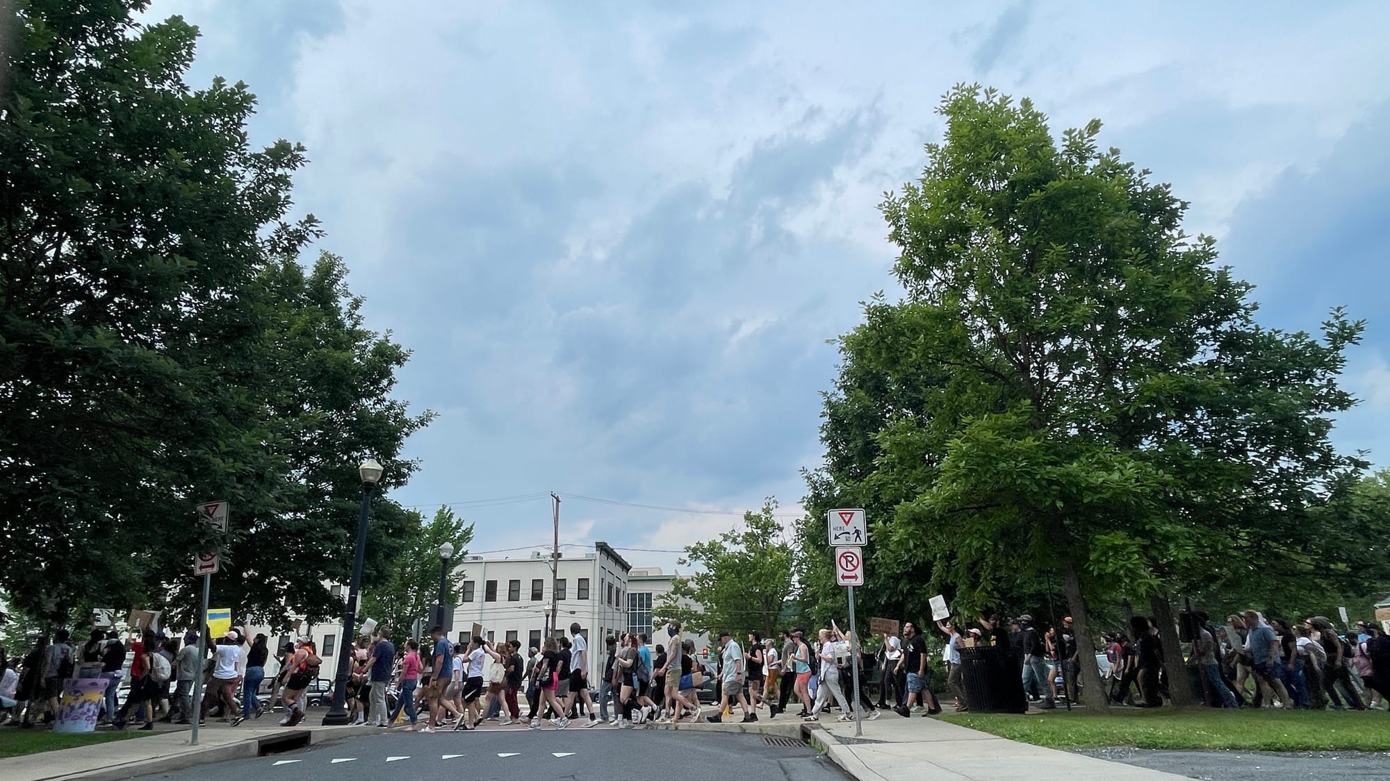 Residents gathered at a rally in Bethlehem on Thursday, June 12 to protest a federal immigration raid at the fire-damaged Fiv