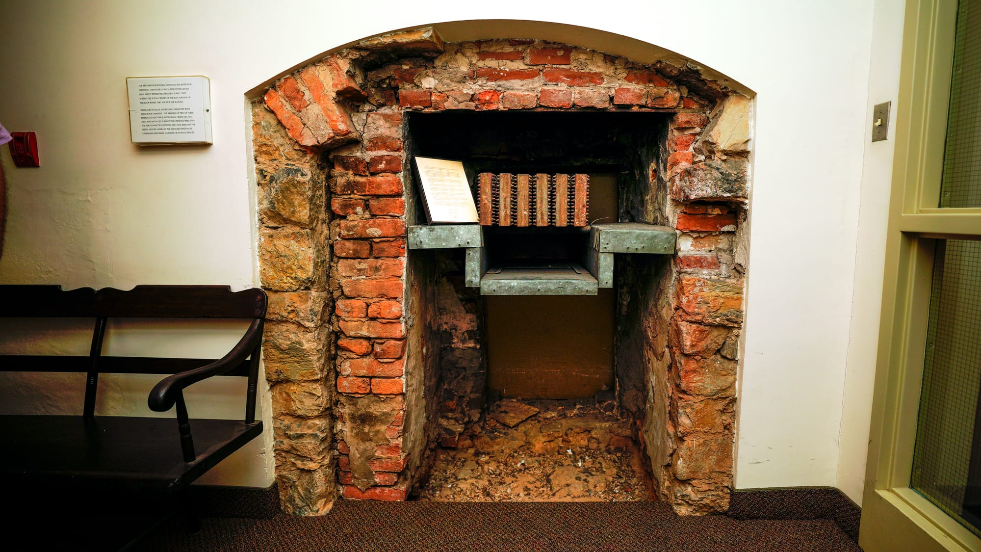 One of four large fireplaces that heated the Brethren House which was uncovered from under plaster possibly in the 1970s. Tou