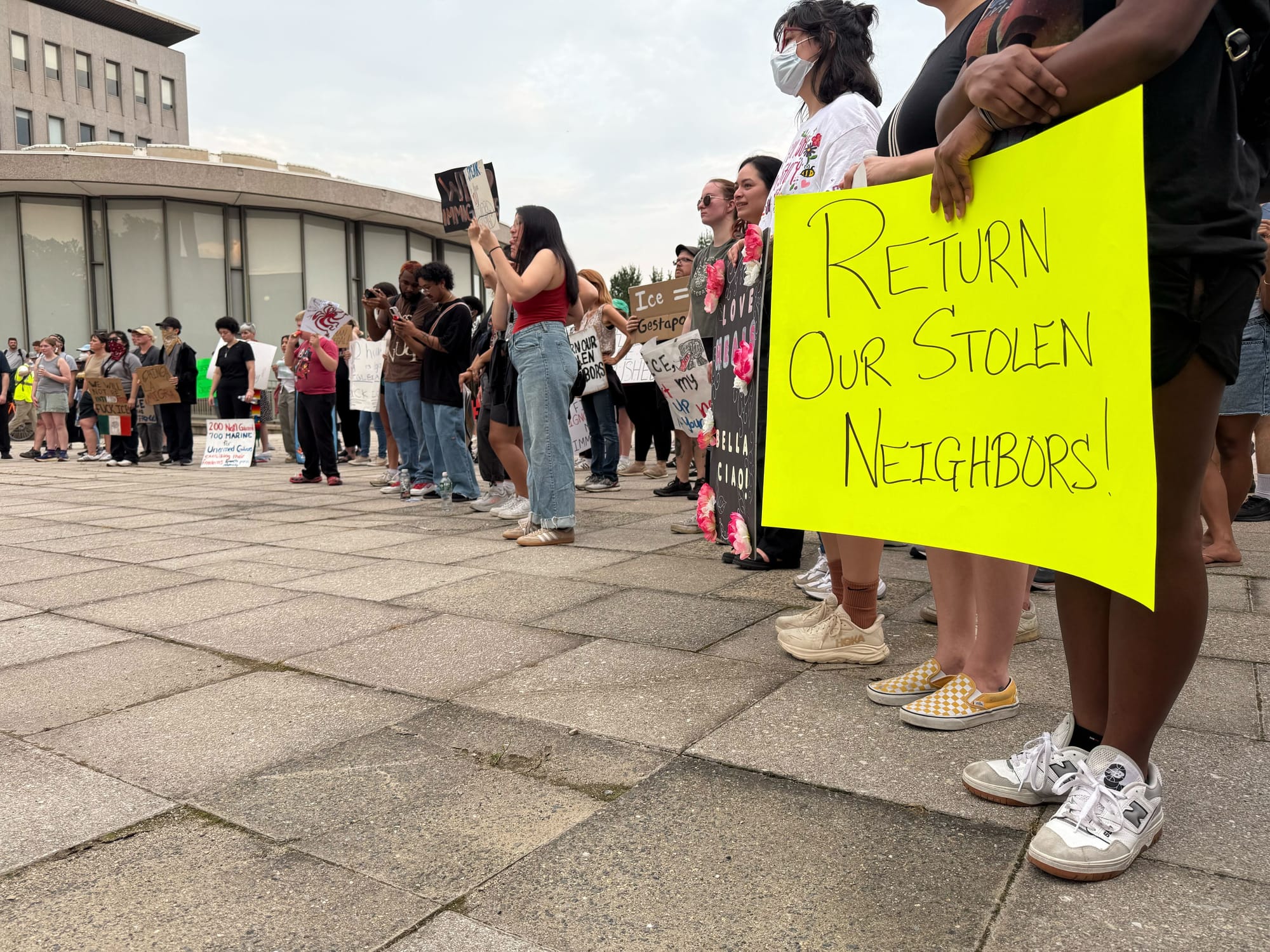 Residents gathered at a rally in Bethlehem on Thursday, June 12 to protest a federal immigration raid at the fire-damaged Fiv