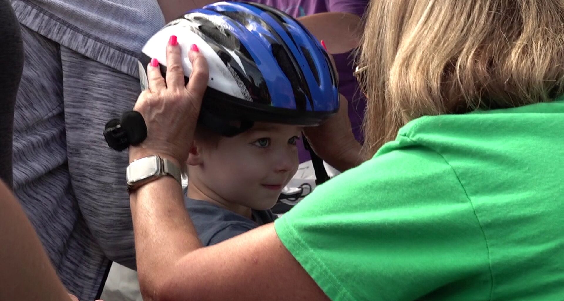 Helmet giveaway promotes safety at Pittston Tomato Festival