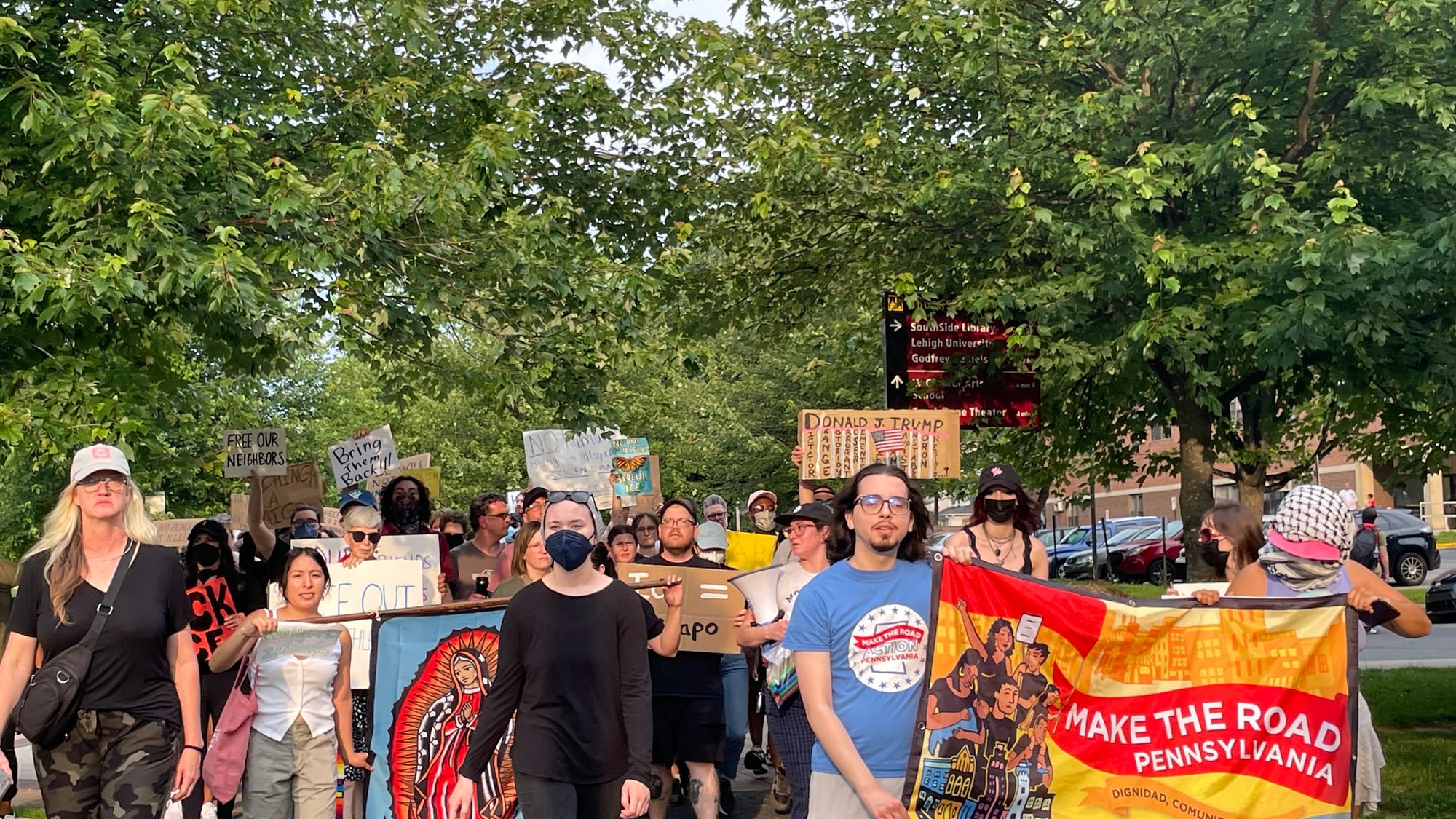 Residents gathered at a rally in Bethlehem on Thursday, June 12 to protest a federal immigration raid at the fire-damaged Fiv