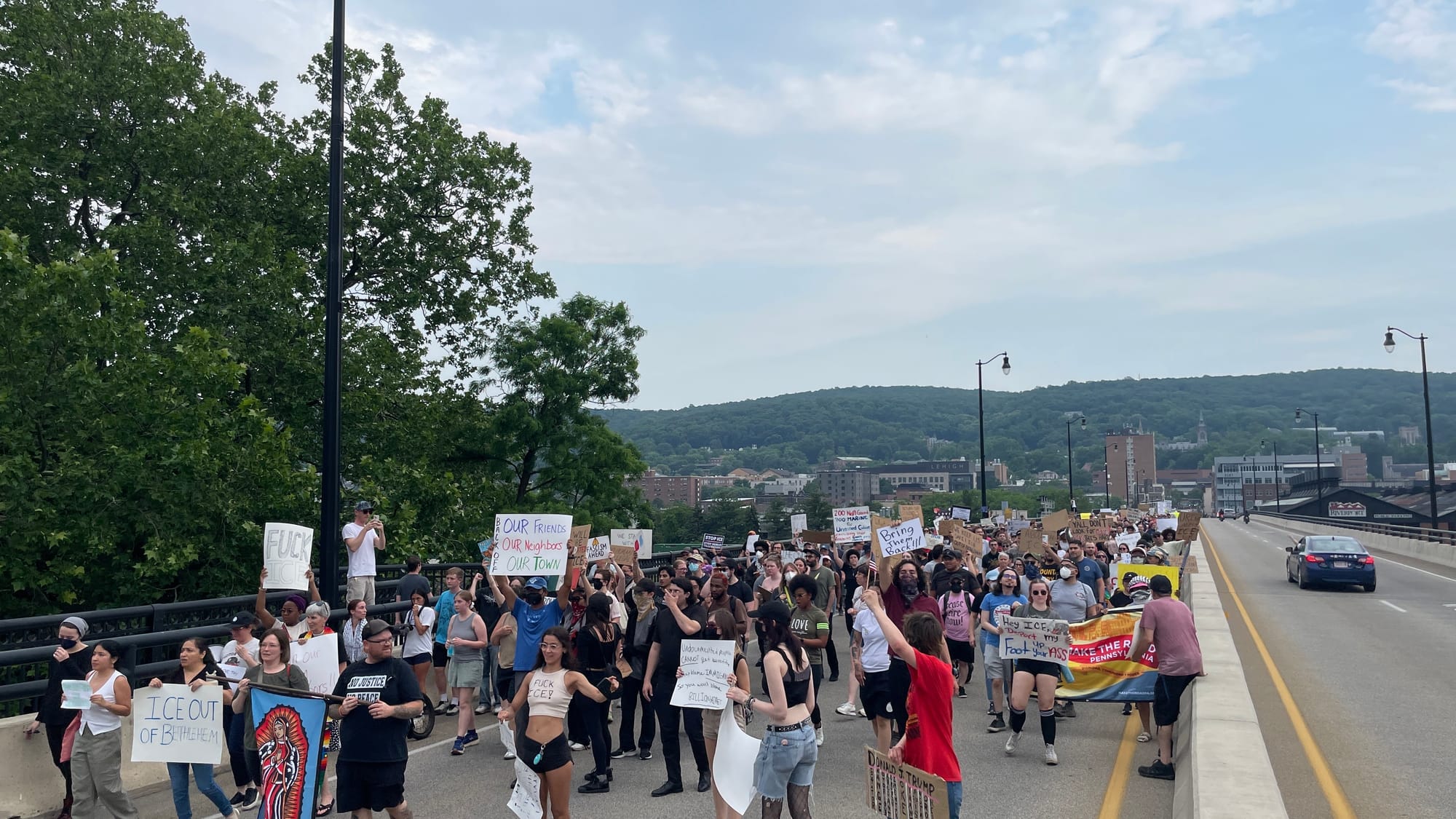 Residents gathered at a rally in Bethlehem on Thursday, June 12 to protest a federal immigration raid at the fire-damaged Fiv