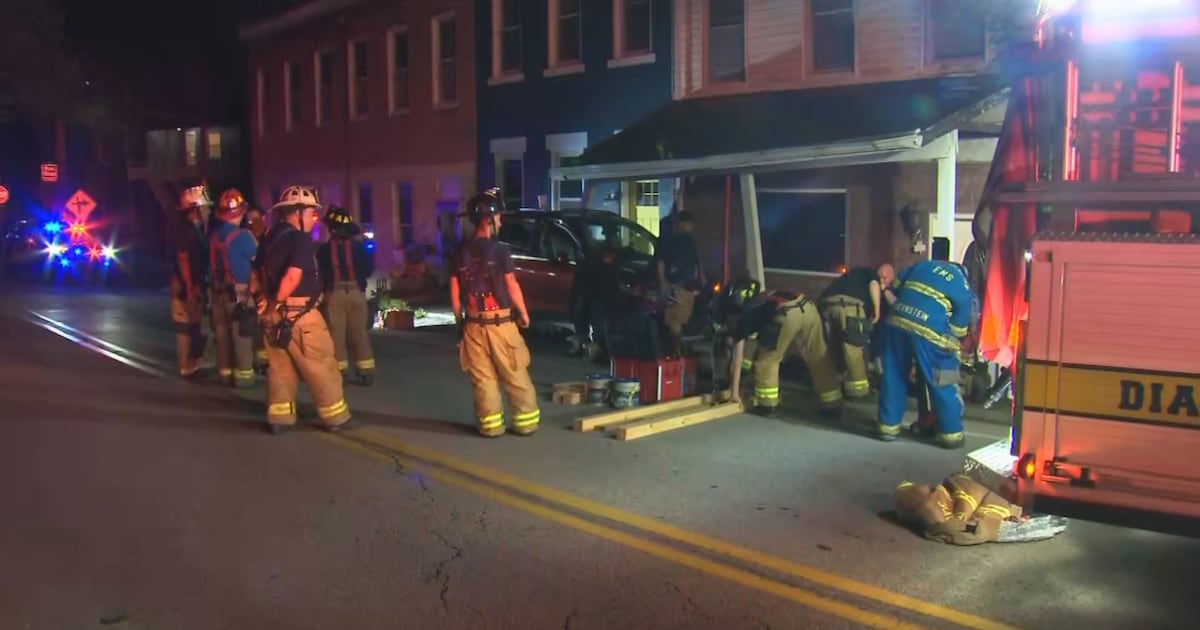 1 hospitalized after vehicle apparently crashes into porch in Reserve Township