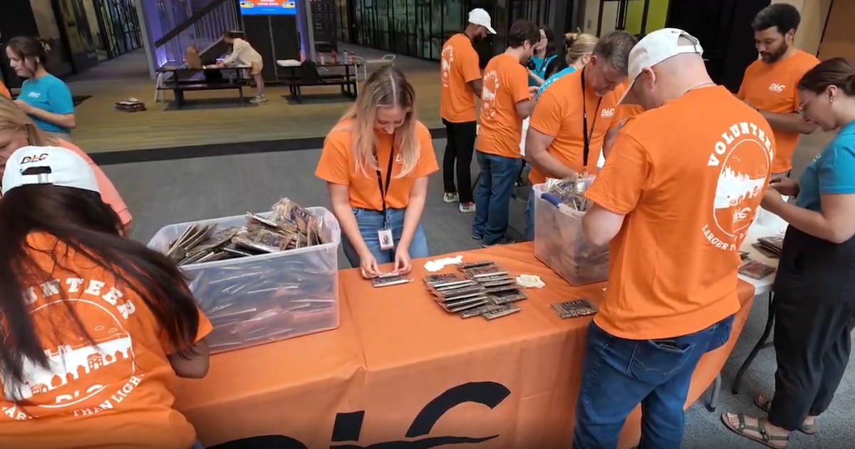 Duquesne Light volunteers pack treat bags, care kits for local families in need