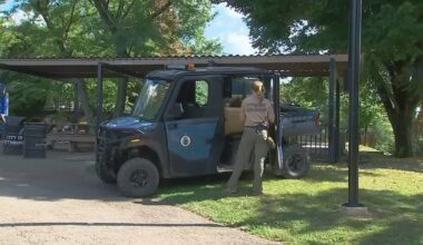 Park rangers meet with community members during National Night Out in Frick Park