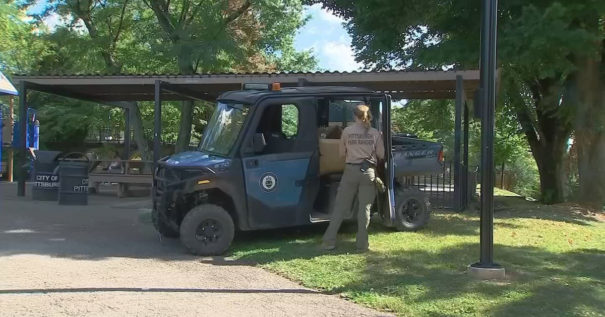 Park rangers meet with community members during National Night Out in Frick Park