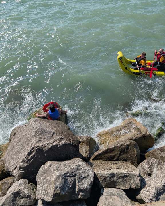 Fire crews rescue kayaker stranded on rocks in Lake Erie