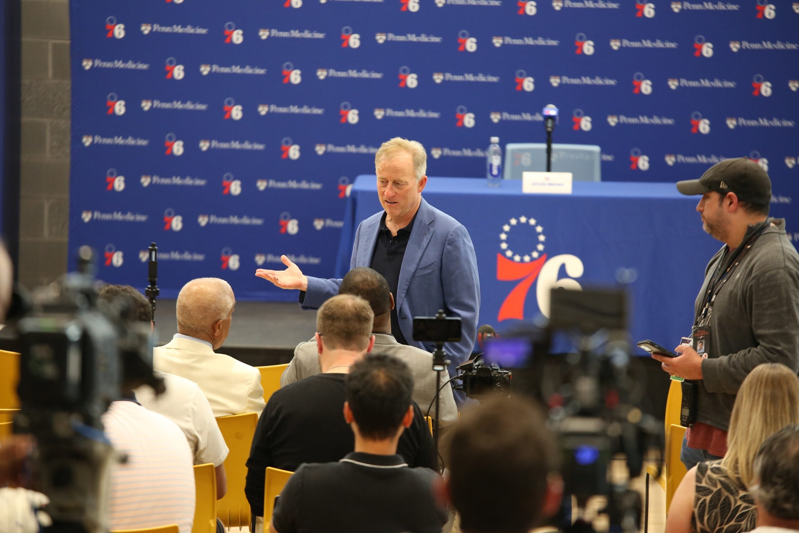Josh Harris speaks to the media