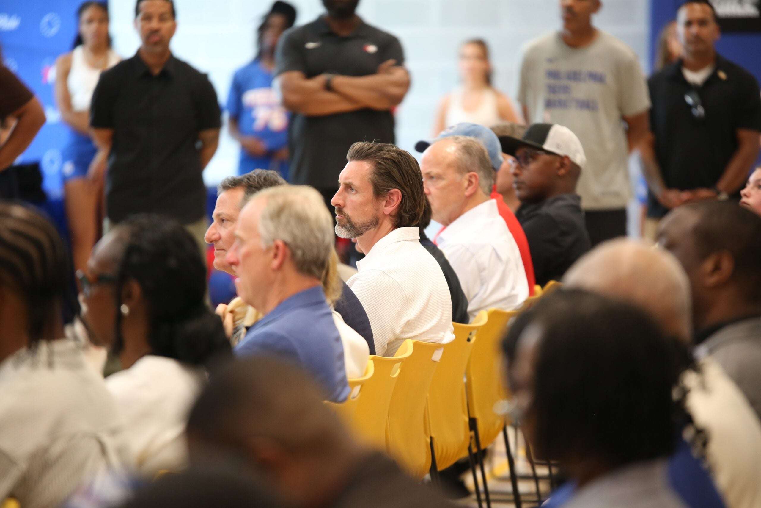 Mike Gansey sits and looks on